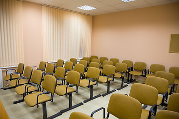 Image showing Interior of a conference hall in pink tones