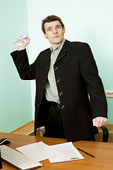 Image showing Director on a workplace with a crushed paper