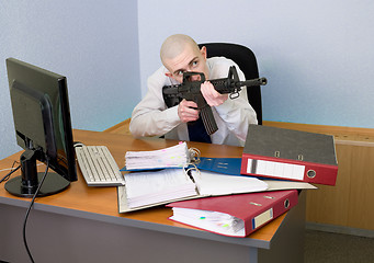 Image showing Accountant armed with a rifle