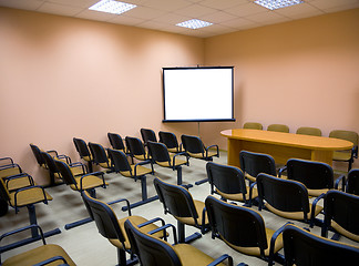 Image showing Interior of a conference hall in pink tones