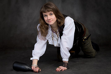 Image showing The funny girl - pirate with bottle