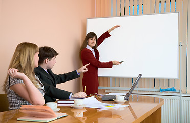 Image showing Young woman to speak at a meeting