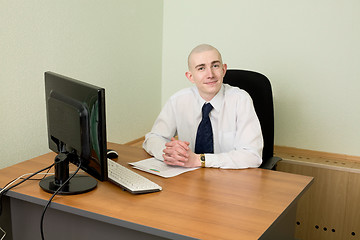 Image showing Businessman on a workplace