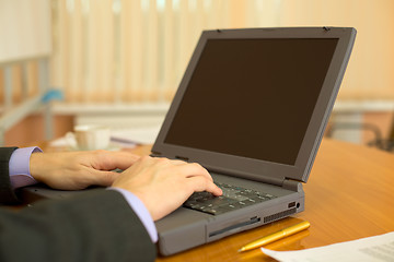 Image showing Business people planning on the laptop