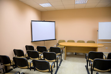 Image showing Interior of a conference hall in pink tones