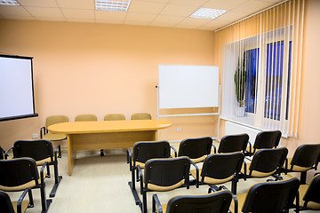 Image showing Interior of a conference hall in pink tones