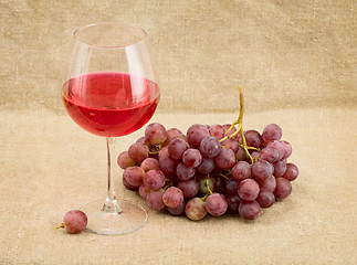 Image showing Goblet and grapes