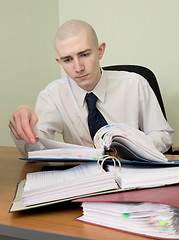 Image showing Bookkeeper on a workplace at office