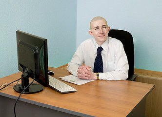 Image showing Businessman on a workplace