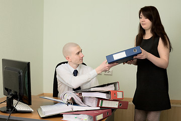 Image showing Bookkeeper and the secretary on a workplace