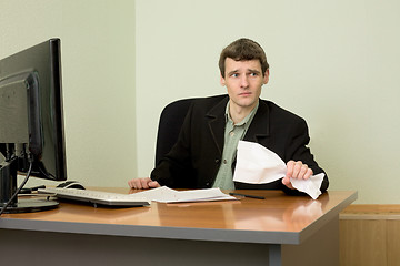 Image showing Director on a workplace with a crushed paper