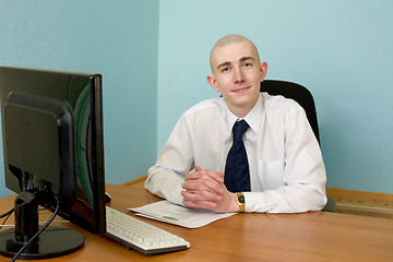 Image showing Businessman on a workplace