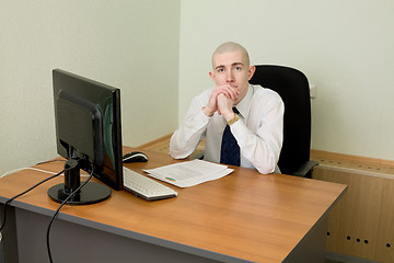 Image showing Businessman on a workplace