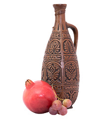 Image showing Still-life with a bottle and pomegranate