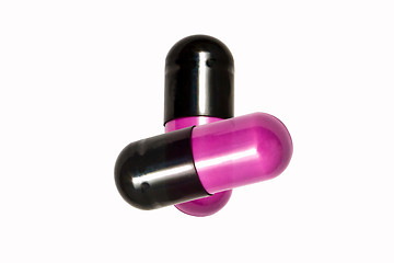 Image showing Pink capsules