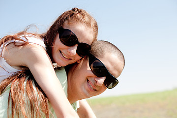 Image showing young Couple Piggybacking