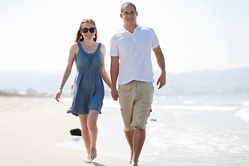 Image showing love couple walk on the beach