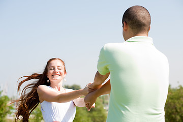 Image showing young couple paly at park