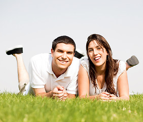 Image showing happy Couple lie down on grass