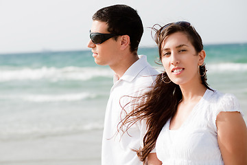 Image showing young Cute Couple walk on the beach