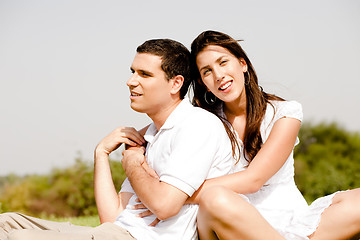 Image showing love Couple Sitting Together Outside