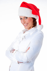 Image showing Female Santa pointing down at blank billboard