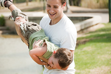 Image showing father playing with son