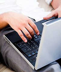 Image showing isolated grey open laptop man typing
