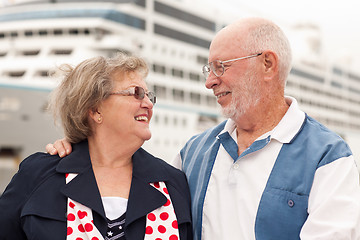 Image showing Senior Couple On Shore in Front of Cruise Ship