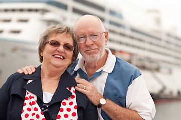 Image showing Senior Couple On Shore in Front of Cruise Ship