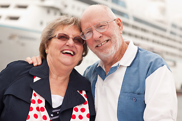 Image showing Senior Couple On Shore in Front of Cruise Ship