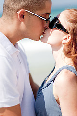 Image showing Romantic Couple kissing on the beach