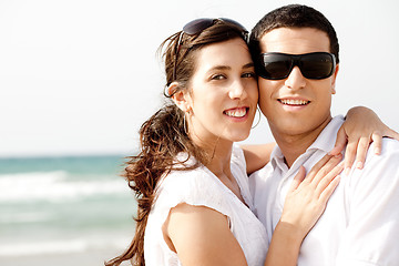 Image showing Romantic coupleholding smiling eachother at the beach