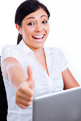 Image showing Excited business woman showing thumbs up