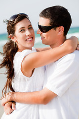 Image showing Portrait of Romantic couple hugging passionately at the beach