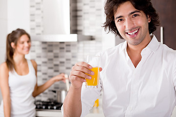 Image showing youn couple cheersing