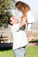 Image showing Father playing with Daughter