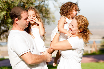 Image showing Parents with two kids side view