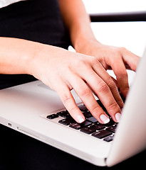 Image showing Hands typing on laptop