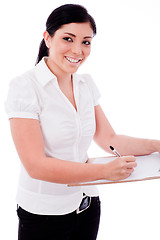 Image showing Business woman looking right corner with her Clip board