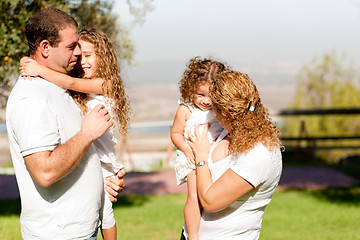 Image showing Side View of a family in the park