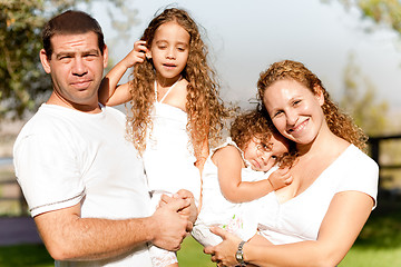 Image showing Caucasian happy family in the park