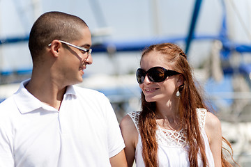 Image showing Couple looking each other at the harbour