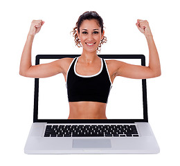 Image showing Fitness woman showing a exercises  position through laptop screen