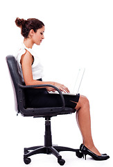 Image showing Portrait of a woman working with laptop