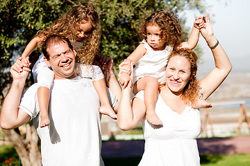 Image showing Happy family having fun in the park