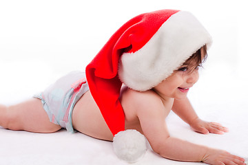 Image showing Santa baby trying to crawl