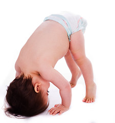Image showing Baby bending down frontwards