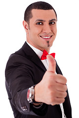 Image showing Business man showing his success with thumbs up