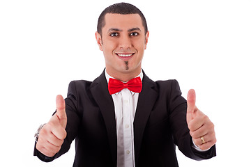 Image showing Half length of successful business man with thumbs up